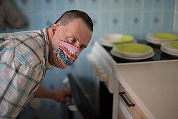 Person wearing mask while working